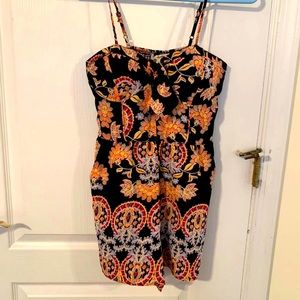 Ladies spaghetti strap, floral, romper.